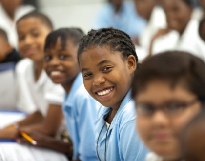 KIPP Tulsa students smiling at the camera