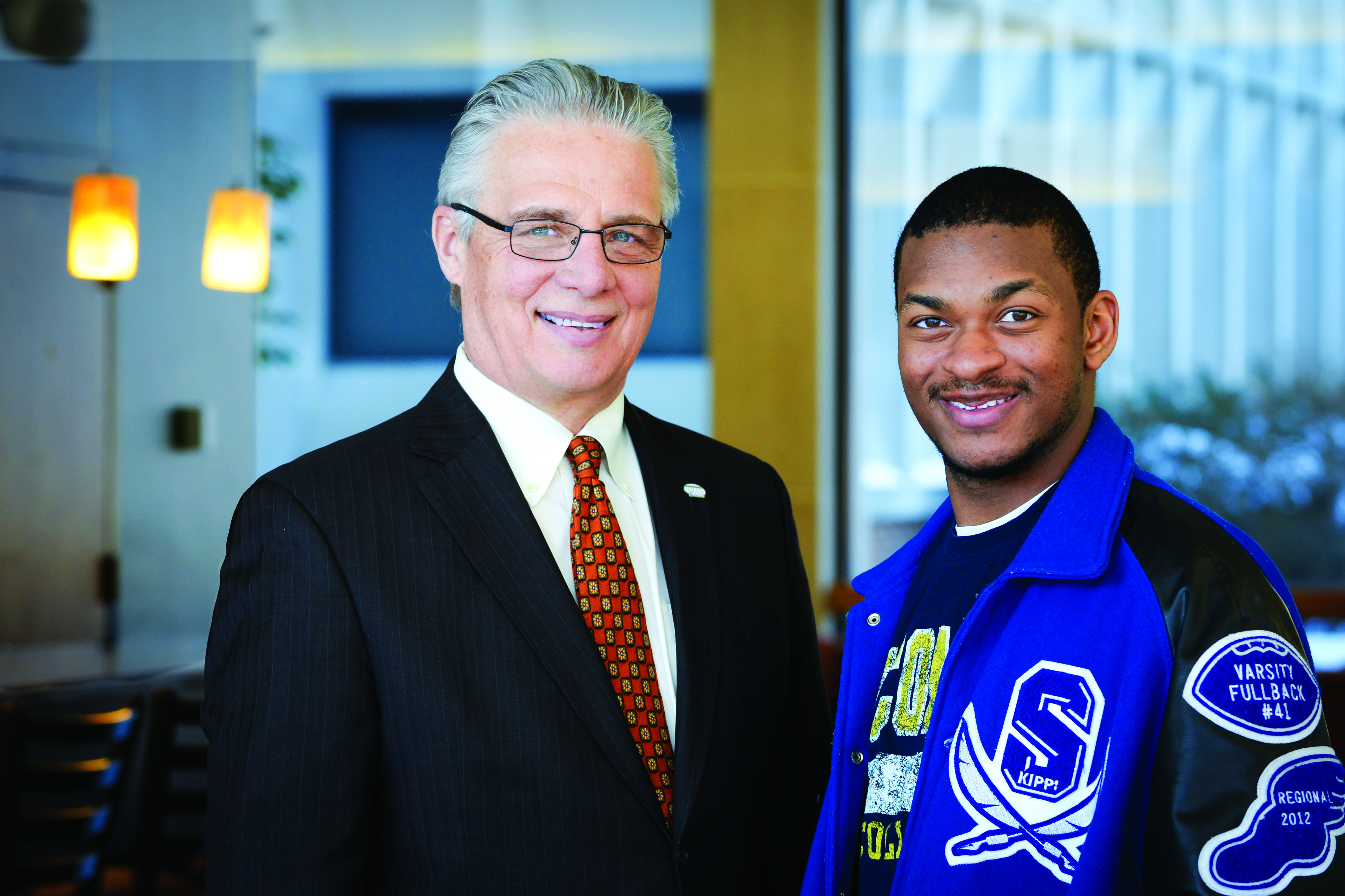 Lycoming College president Kent Trachte with student