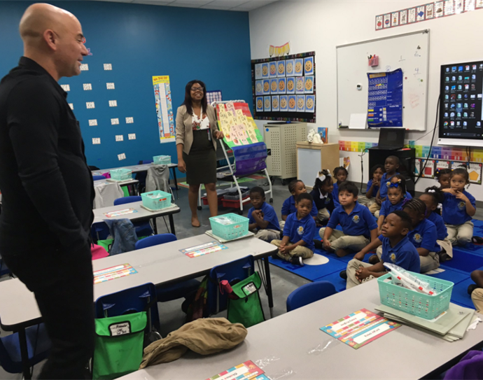Andre Agassi speaking to KIPP Charlotte students