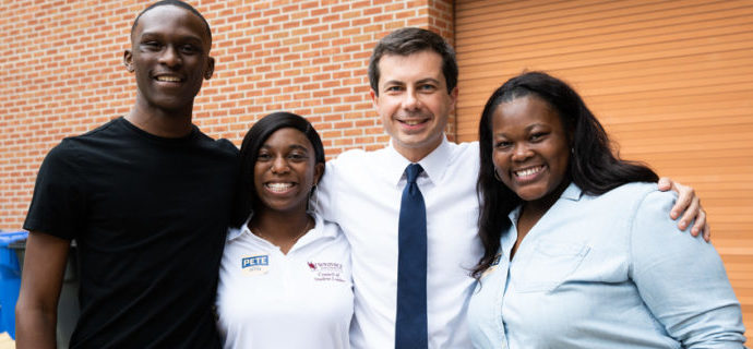 Pete Buttigieg smiling with supporters